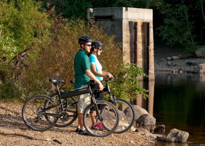 Montague x50 folding bike in front of lake