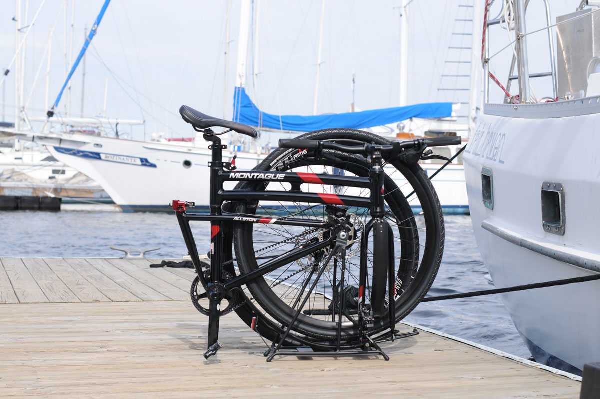 Montague Allston Folding Bike at Marina near Sailboats